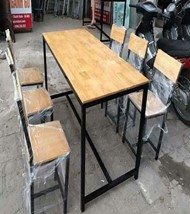 Bộ bàn ăn khung sắt mặt gỗ cao su ghế rời