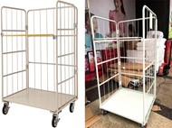 Xe đẩy lồng thép trong kho hàng